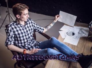 A0TattooedTomas